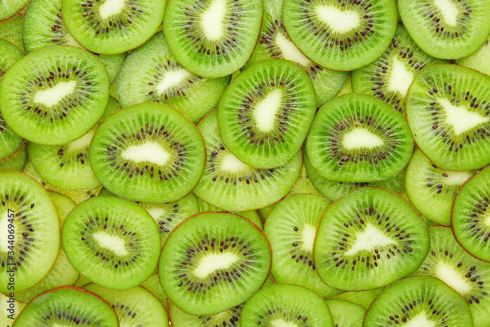 Close up kiwi slices texture as background Close-up Close up kiwi slices texture as background Close-up