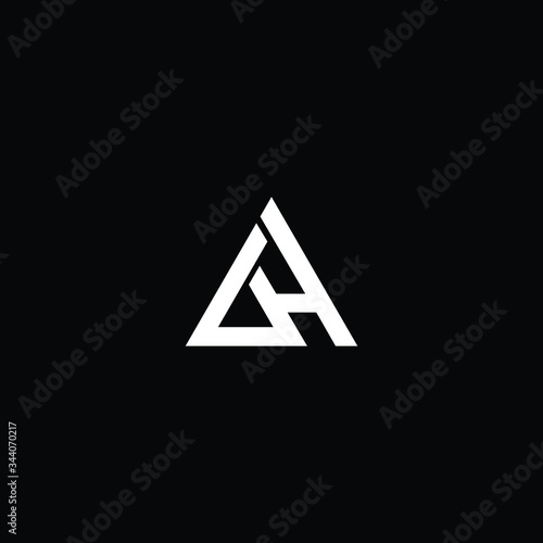 Minimal elegant monogram art logo. Outstanding professional trendy awesome artistic AH HA OH HO initial based Alphabet icon logo. Premium Business logo White color on black background