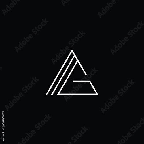 Minimal elegant monogram art logo. Outstanding professional trendy awesome artistic MG GM initial based Alphabet icon logo. Premium Business logo White color on black background