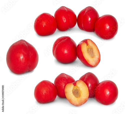 ripe plums on a white background. isolate