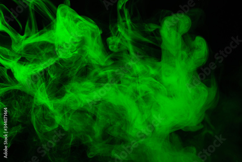 Green steam on a black background.