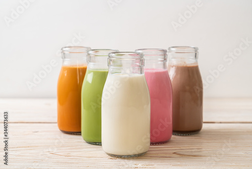 Thai milk tea, matcha green tea latte, coffee, chocolate milk, pink milk and fresh milk in bottle