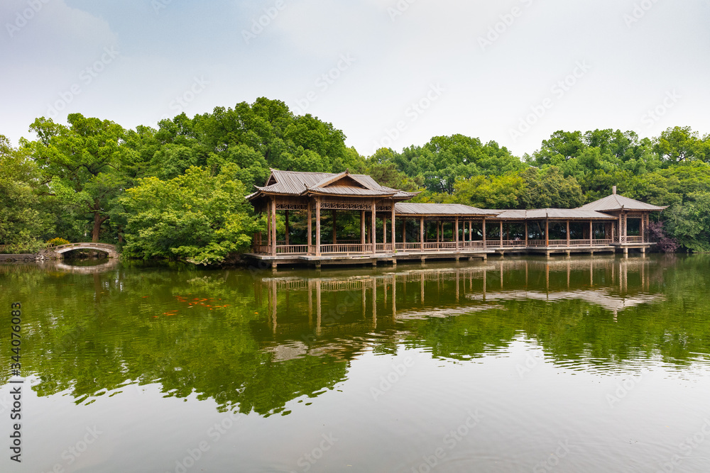 Wooden platform and walking path in West Lake gardens in Hangzhou, China Wooden platform and walking path in West Lake gardens in Hangzhou, China
