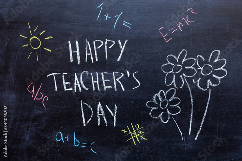 Happy Teachers Day written in chalkboard