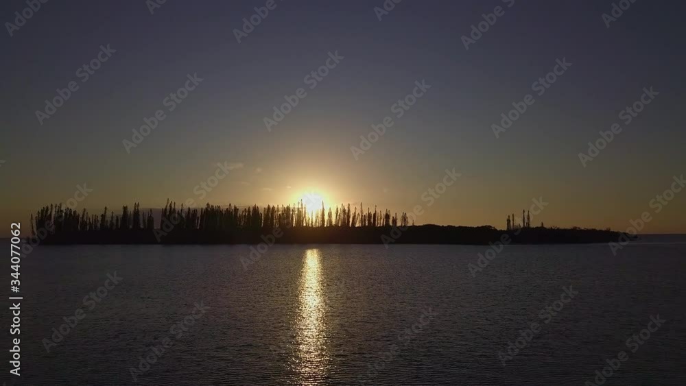 Aerial sunset over Isle of Pines, New Caledonia, dolly forward Aerial sunset over Isle of Pines, New Caledonia, dolly forward
