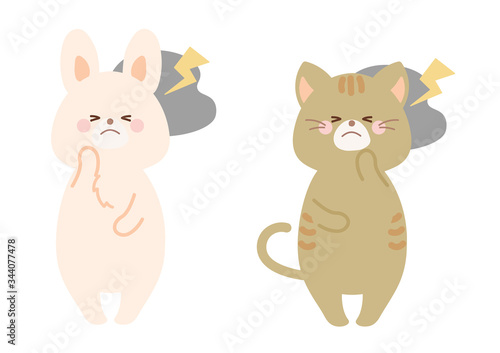 頭が痛い　頭痛の猫とうさぎ