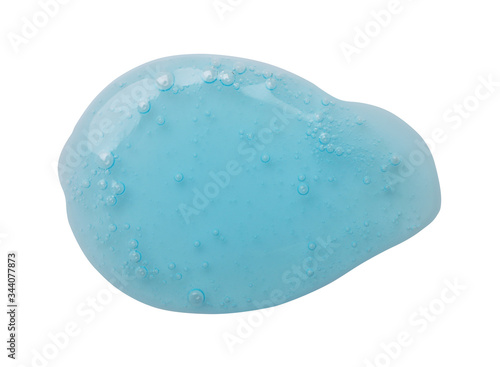 Sample of light blue cosmetic gel on white background, top view