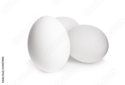 Fresh raw chicken eggs isolated on white