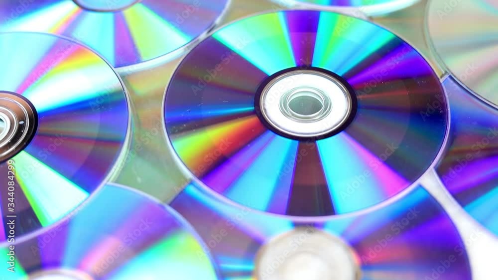 Closeup of Compact Disc. Pile of Archived CD cassettes. Closeup of Compact Disc. Pile of Archived CD cassettes.