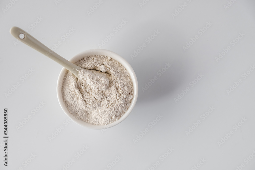 White cosmetic clay powders on white background. Flat lay White cosmetic clay powders on white background. Flat lay