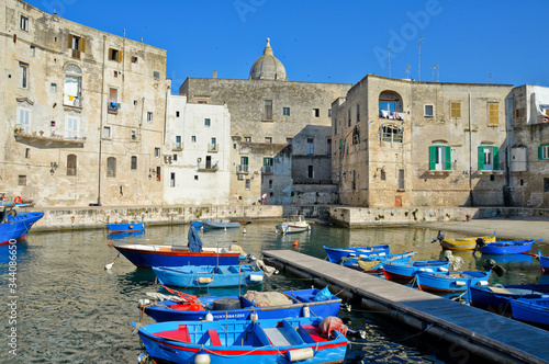 Fotografie Boats in the ancient port of the old town of Monopoli, Italy