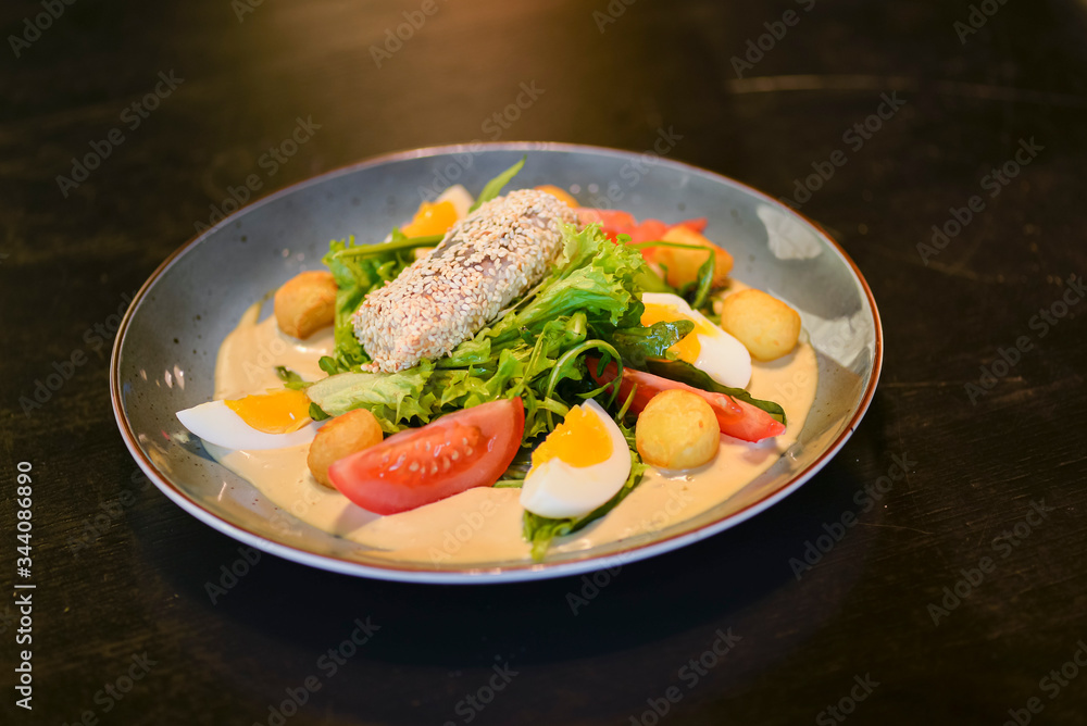 Tasty healthy breakfast with carpaccio meat, boiled eggs, corn, tomatoes and fresh salad. Healthy food. Tasty healthy breakfast with carpaccio meat, boiled eggs, corn, tomatoes and fresh salad. Healthy food.