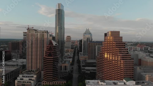 Aerial Drone shot of the Texas capital looking down congress at sunset. During the Covid-19 Pandemic. photo