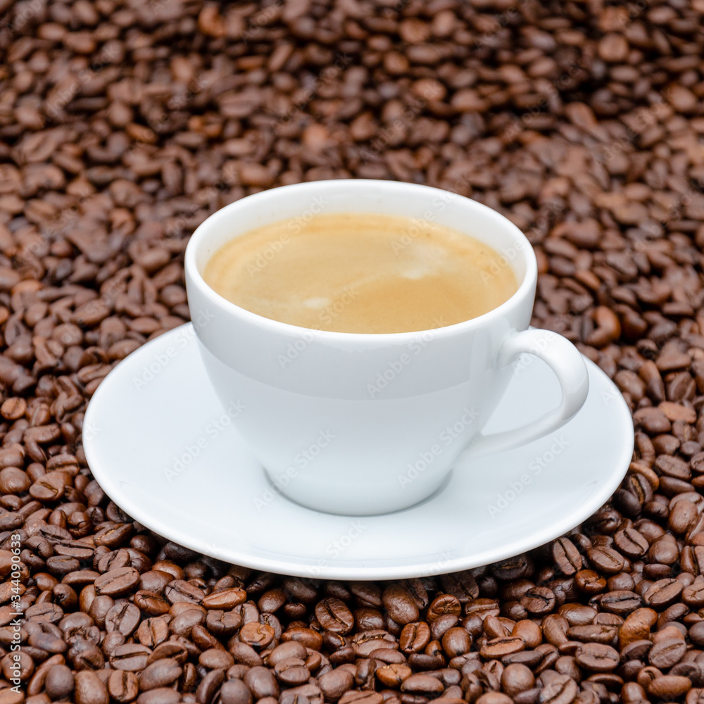white coffee cup with coffee beans white coffee cup with coffee beans