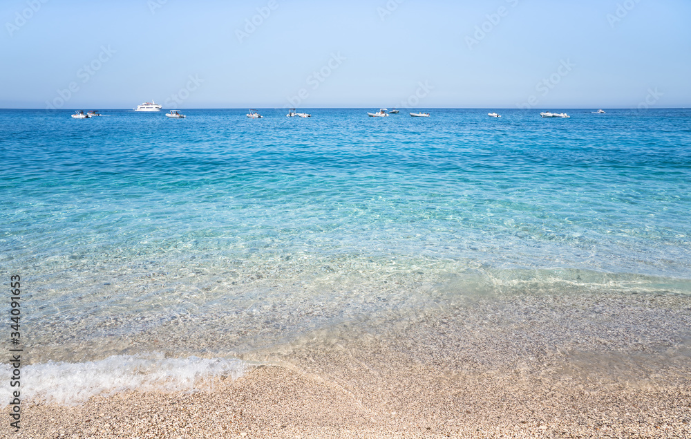Fototapeta premium Clear azure coloured sea water, Sardinia, Italy