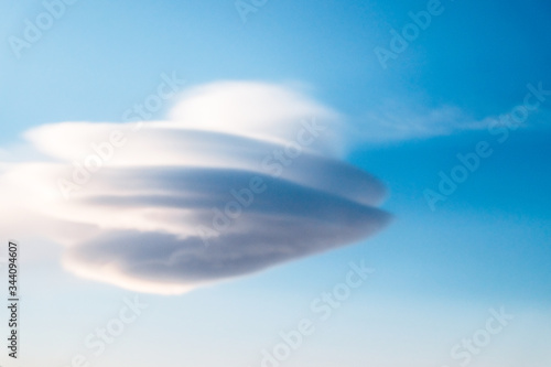 The strange shape of the clouds like the cloud UFO flying  Strange clouds.