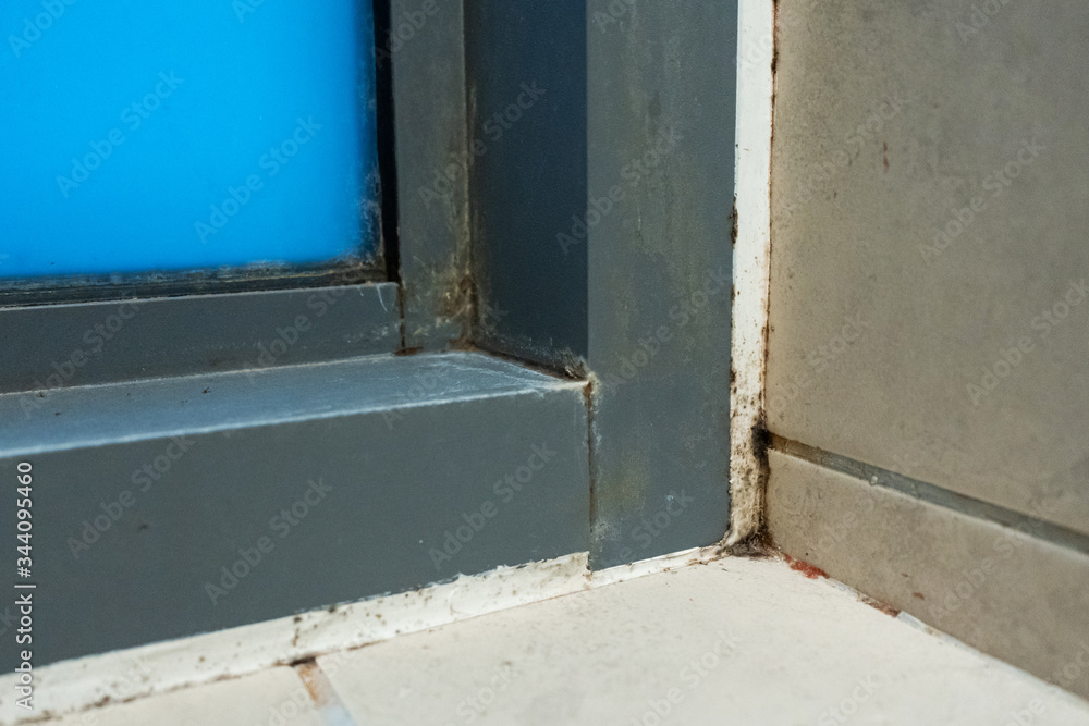 Old plastic window frame in the shower. Moldy angle, fungus. Problem areas shower. Old plastic window frame in the shower. Moldy angle, fungus. Problem areas shower.