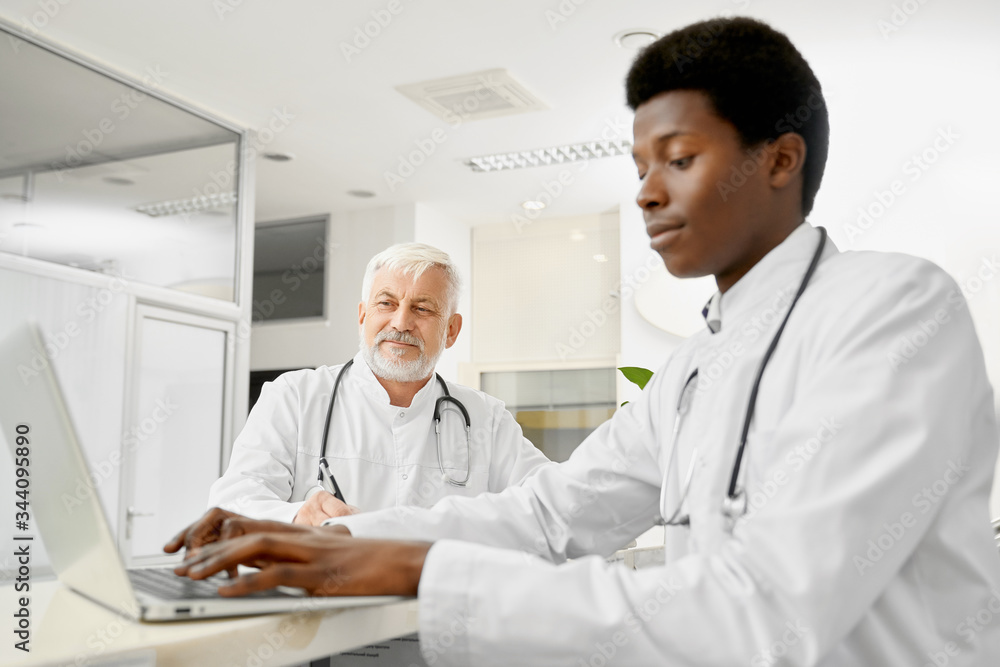 Multicultural doctors on reception. Multicultural doctors on reception.