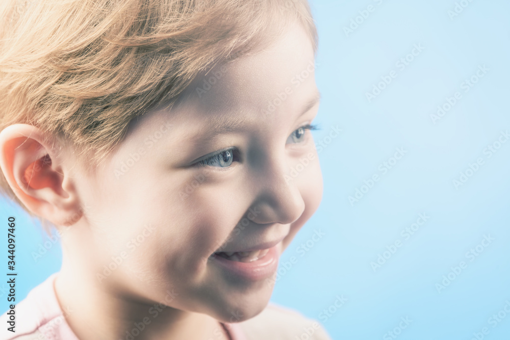 Cute baby rejoices with smile on his face. The concept of joy. Cute baby rejoices with smile on his face. The concept of joy.