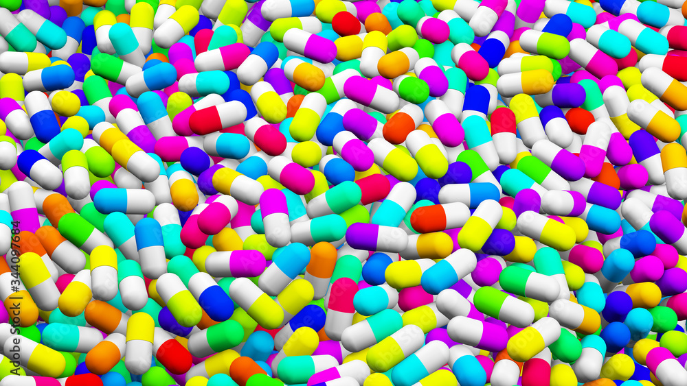 scattered pills in different colors, concept medication and health	￼