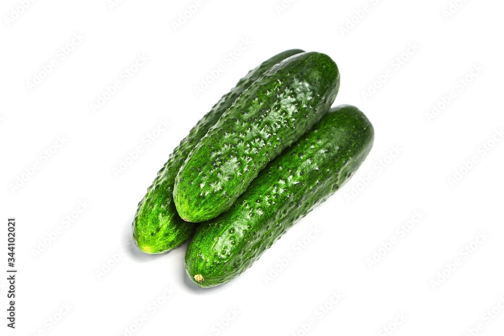 Gherkins isolated on white background. Three green fresh gherkins Gherkins isolated on white background. Three green fresh gherkins