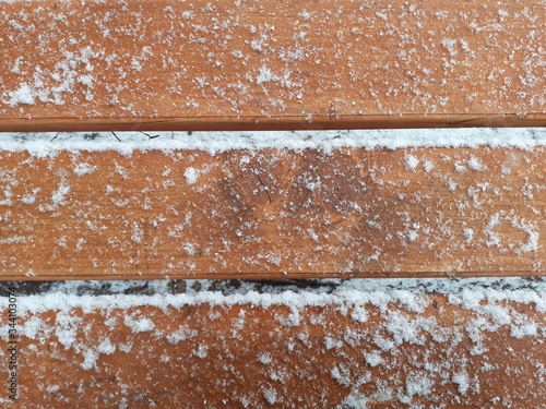 wooden planks in the snow, suitable for background