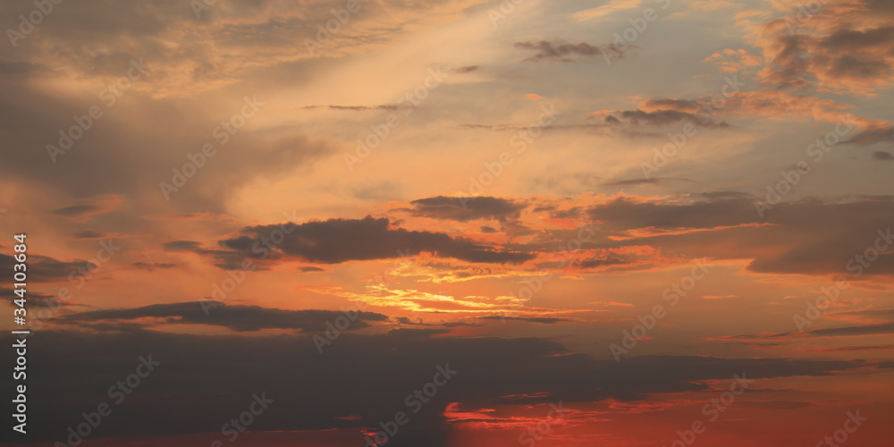 Dramatic sunset sky. Cloudy sky as a background.