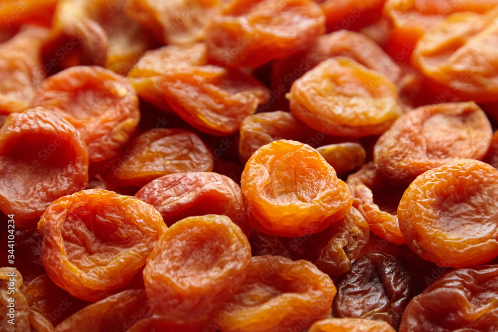 Dried apricots background. Heap of dry apricot fruits Dried apricots background. Heap of dry apricot fruits