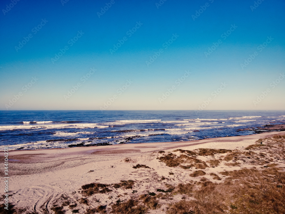 Beautiful aerial vibrant view of Esposende in Portugal. View from the Portuguese coastline (Natural Park of the North Coast) with the Atlantic ocean. Beautiful aerial vibrant view of Esposende in Portugal. View from the Portuguese coastline (Natural Park of the North Coast) with the Atlantic ocean.