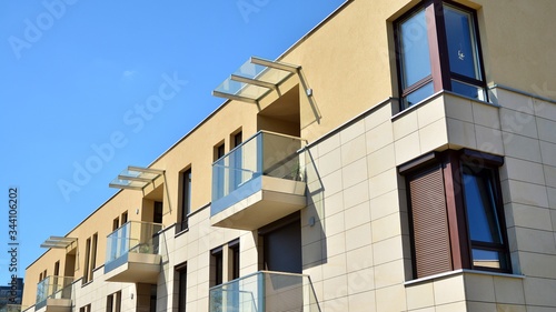 Residential Building on sky background. Facade of a modern housing construction with of balconies.