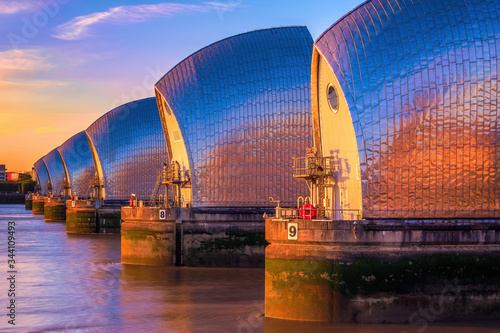 Thames Barrier in London at sunset photo