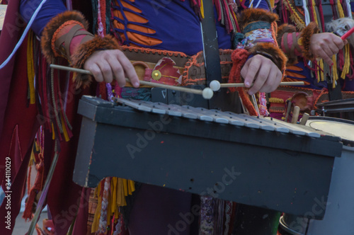 person playing metallophone, carnival music photo