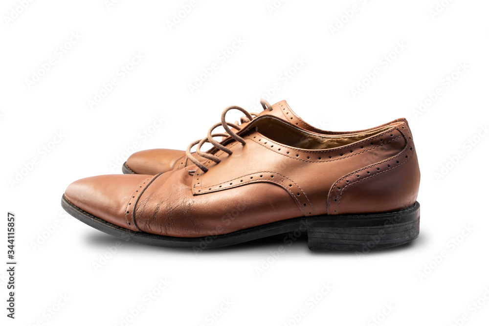 Men's brown leather shoes isolated on white background with clipping path.
