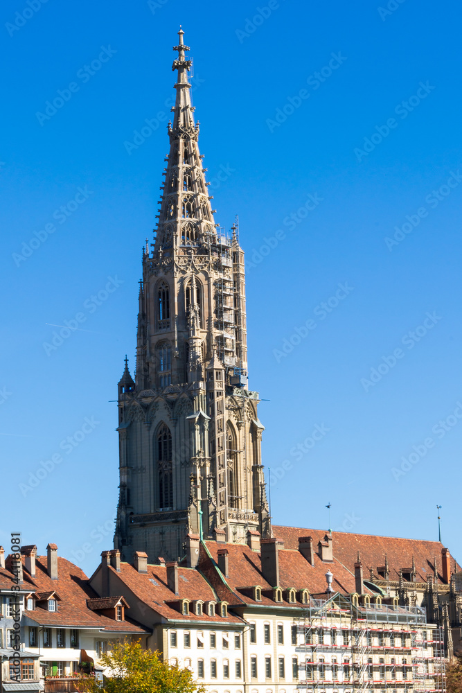 Fototapeta premium Minster cathedral and roofs of old city aerial view, Bern