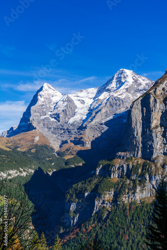 Alps mountains of Berner Oberland with Eiger, Monk and Jungfrau peaks