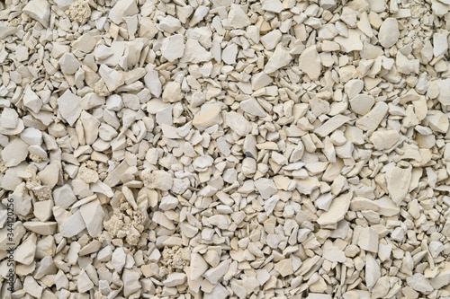 White clay powder texture. Close up. Ural food clay. Texture. Background. top view. Flat lay. No people. Selective focus