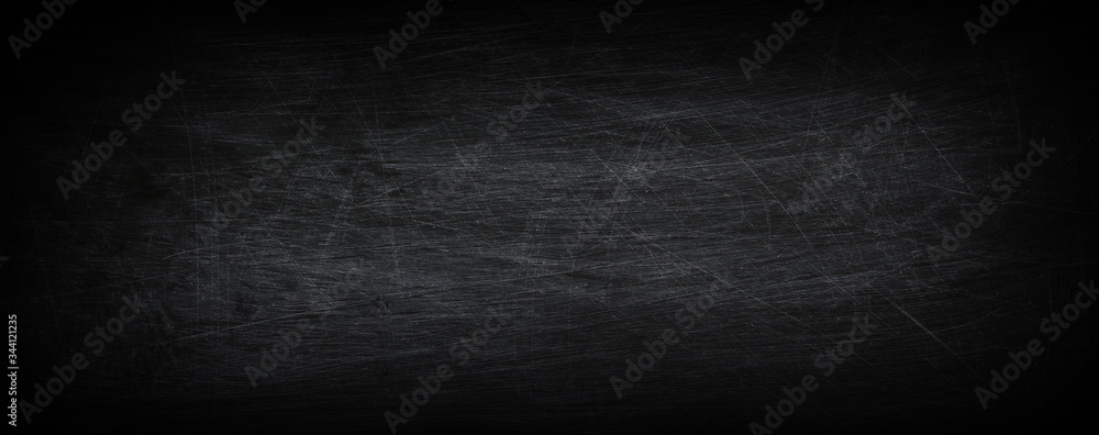 Dark, grunge and scratched chalkboard texture with empty space for text Dark, grunge and scratched chalkboard texture with empty space for text