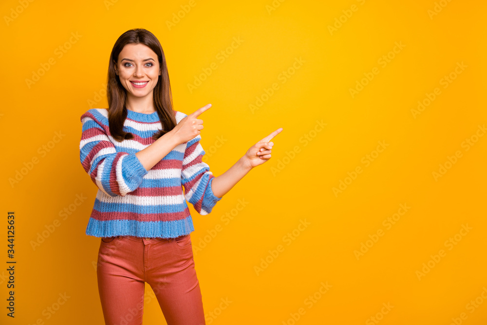 Portrait of positive cheerful girl promoter point index finger copyspace recommend suggest select ads promotion wear pullover trousers isolated over shine color background Portrait of positive cheerful girl promoter point index finger copyspace recommend suggest select ads promotion wear pullover trousers isolated over shine color background