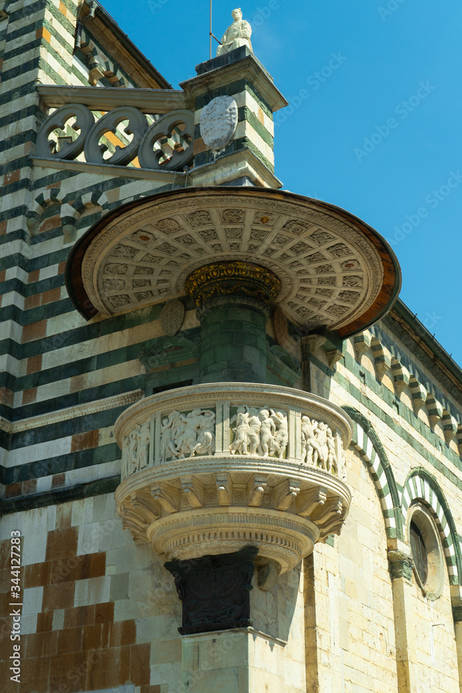 View of the famous pulpit of Donatello on the front of the church S. Stefano in Prato, Italy 