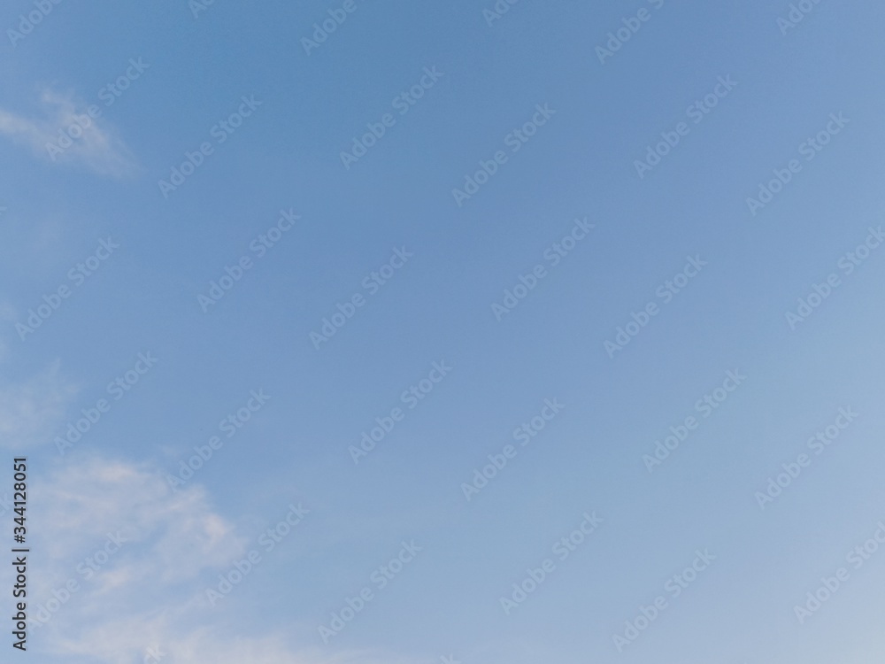 black and white clouds with blue sky