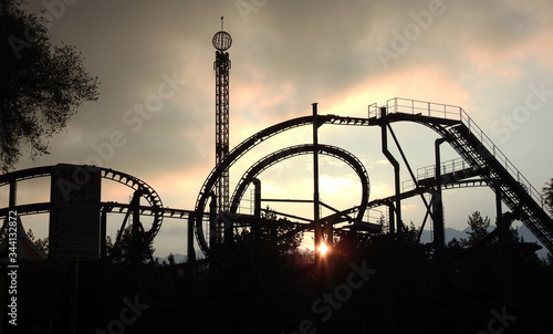 Abandoned roller coaster ride at dawn.     photo