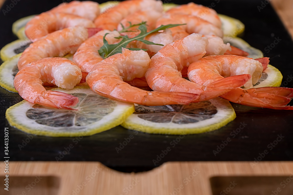 Royal shrimp with lemon as snack Royal shrimp with lemon as snack