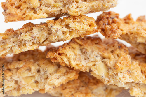 Homemade fresh appetizing oatmeal cookies close-up. The concept of healthy breakfast  homemade food. Light background.