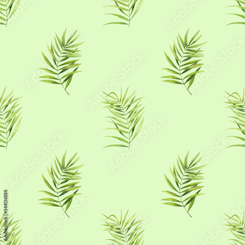 Seamless pattern of green palm leaves on a green background. Elements are drawn in watercolors.