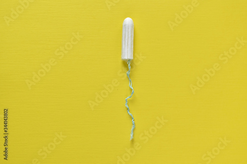 A women s tampon. Menstruation time. Hygiene and security.