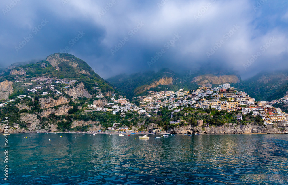 Sea view of beach and colorful buildings  in Positano town  at  Amalfi Coast, Italy.