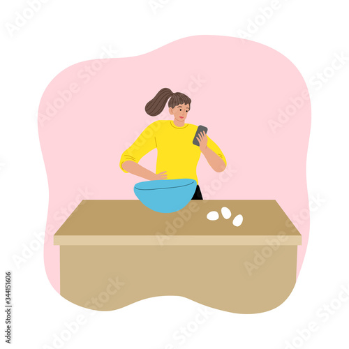 Woman cooking during isolation for protection from coronavirus infection