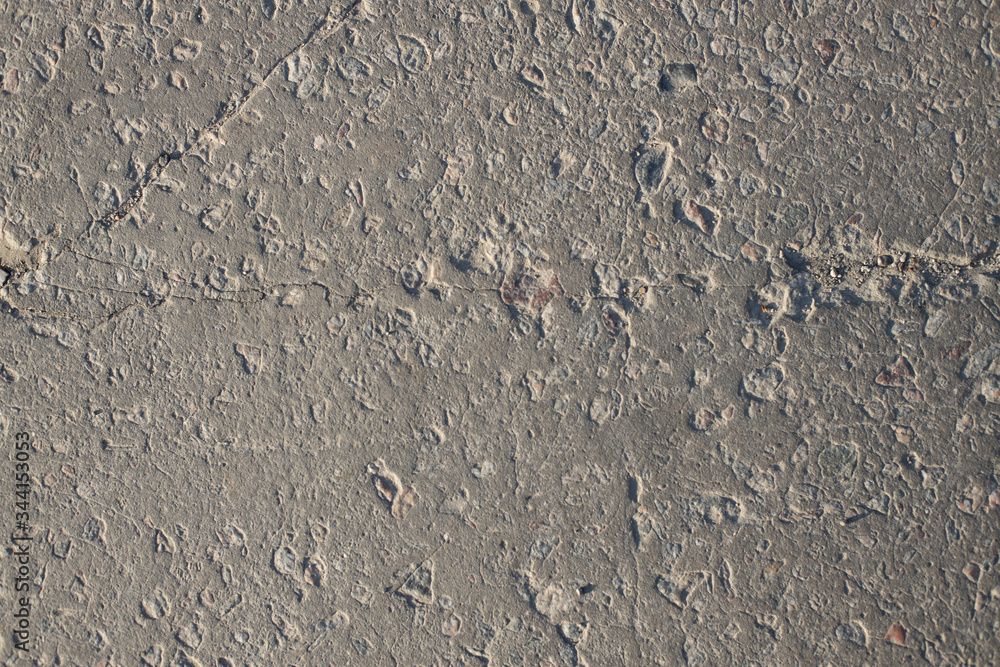 Obraz premium The texture of the broken road. Old building blocks. Background for screensaver monitor