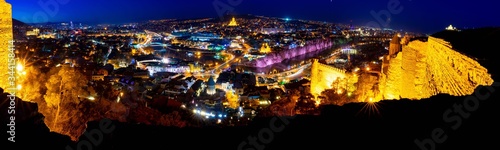 wide angle background image of  tbilisi panorama from Narikala fortress at night.Historical sites  in Georgia. Blank space. 2020