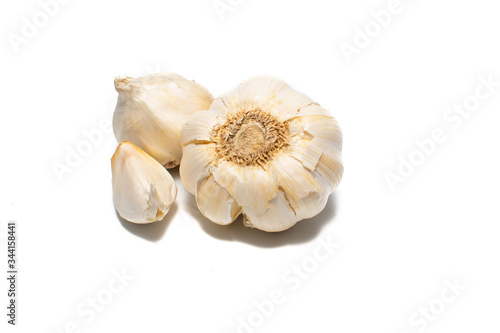 Whole garlic on a white background. Fresh garlic waiting to be peeled and used in food